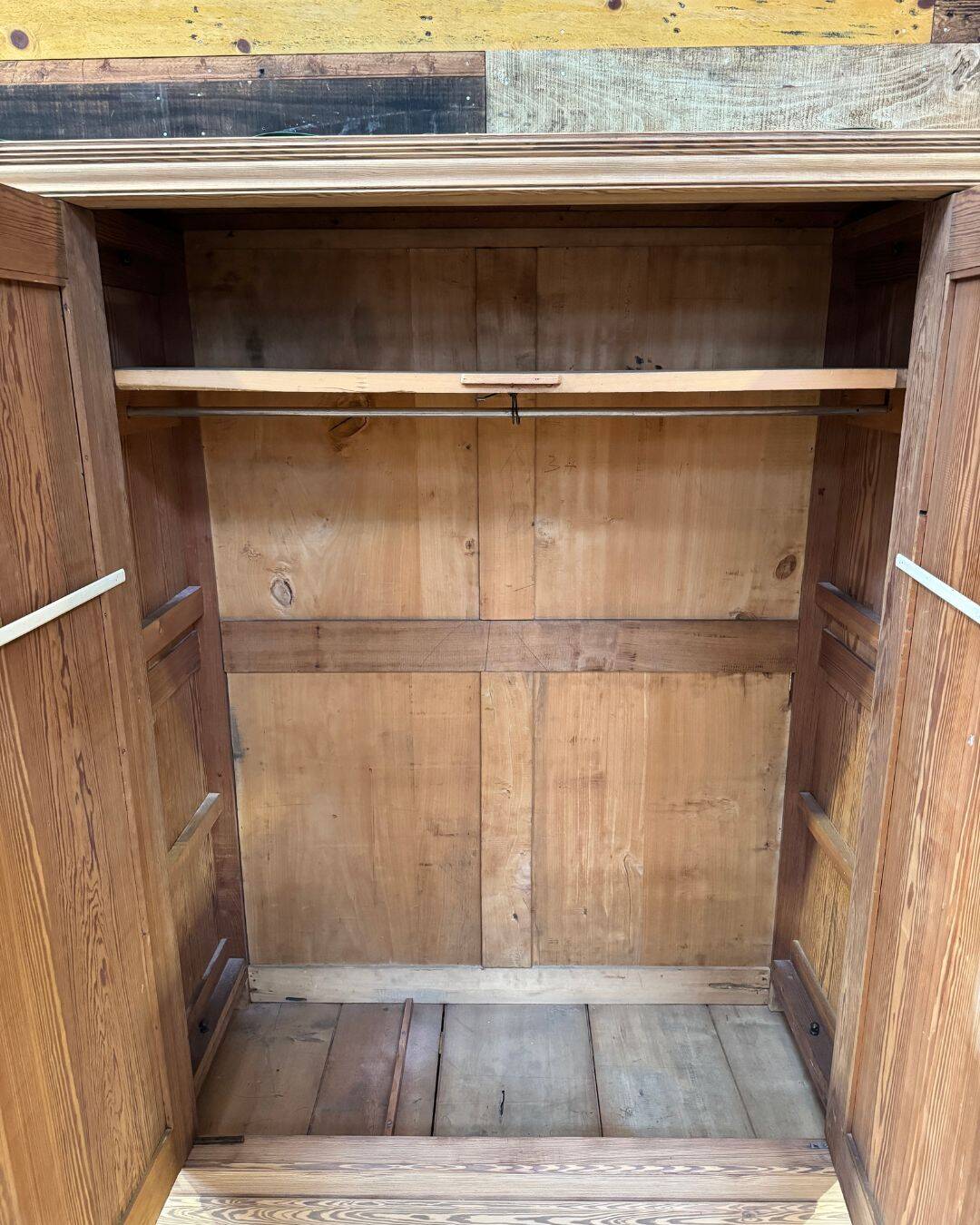 Small antique wardrobe in solid pitch pine.