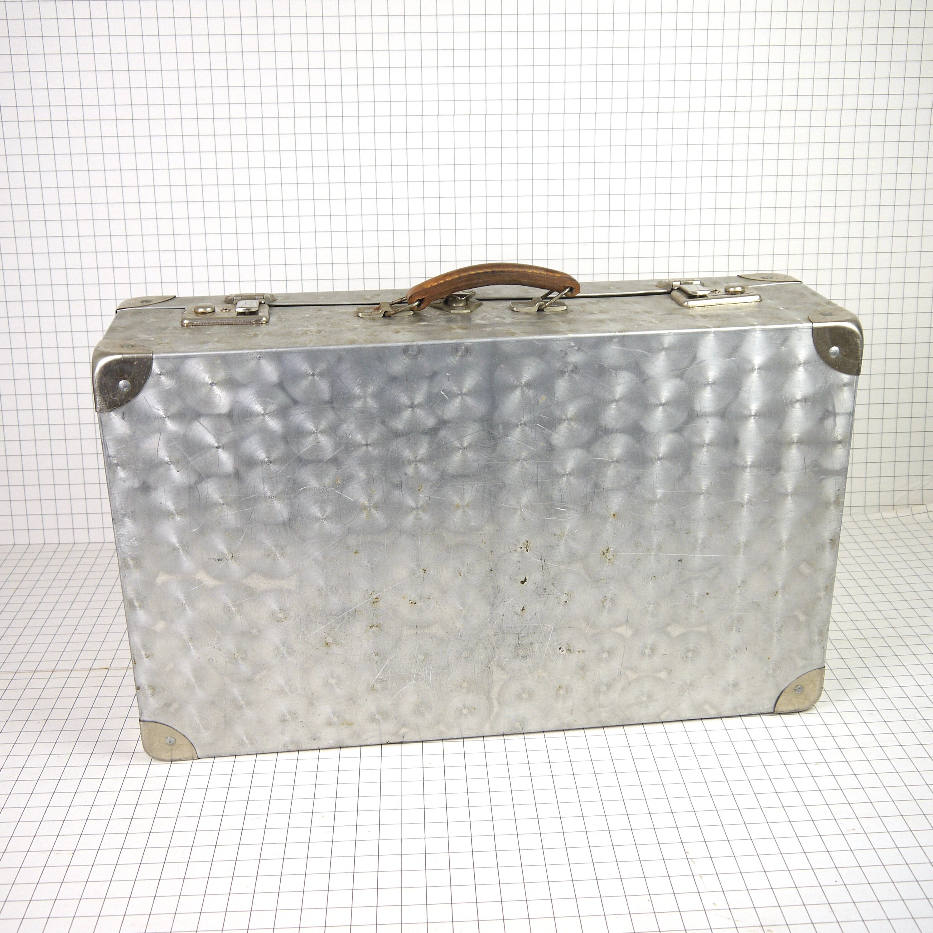 Metal case and leather handle