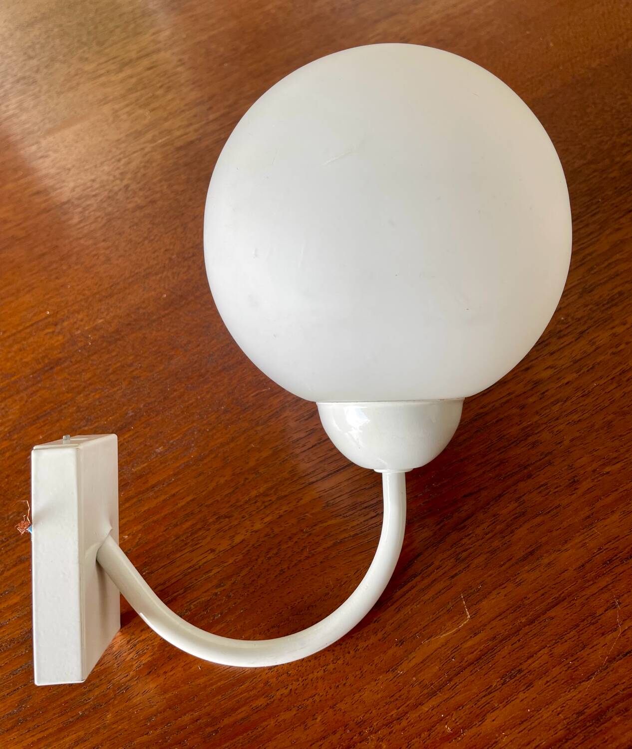 White metal wall light and opaline ball