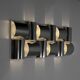 Contemporary wall light in stainless steel and metal.