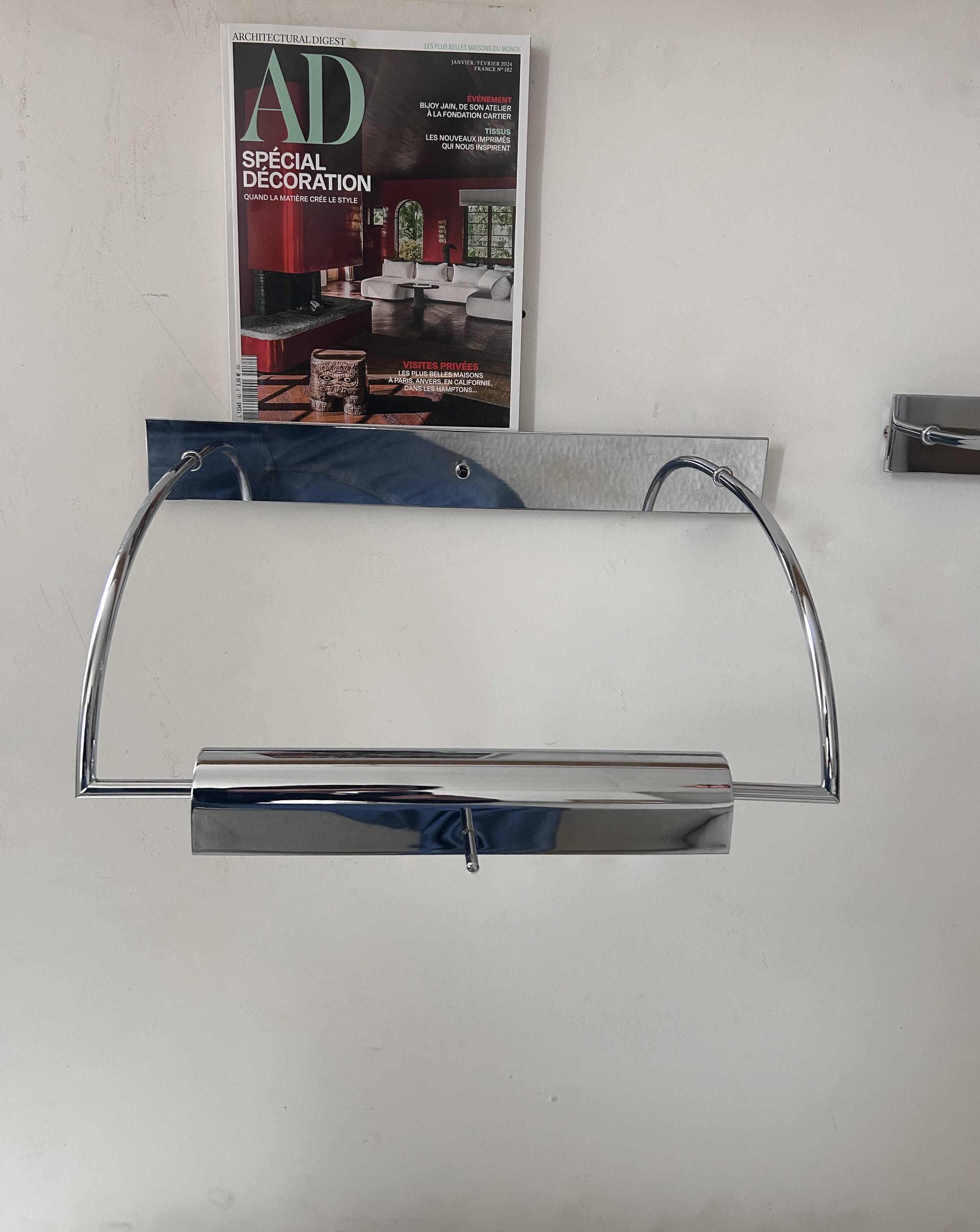 Pair of vintage adjustable wall lights, chrome metal, France 1970.