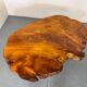 Brutalist Wabi Sabi mid-century coffee table made of natural biological burl wood.