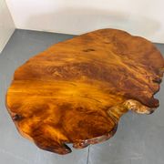 Brutalist Wabi Sabi mid-century coffee table made of natural biological burl wood.