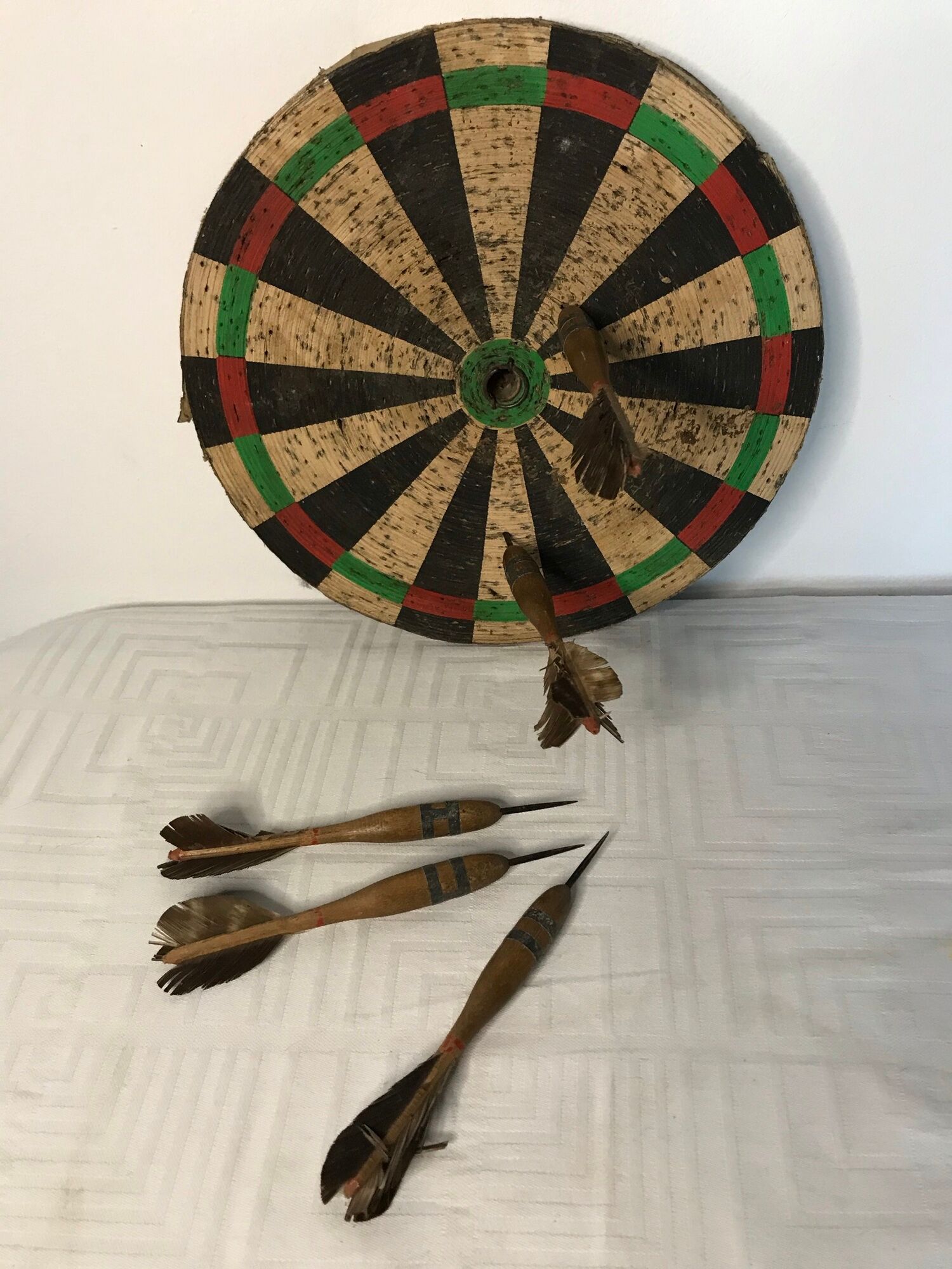 Old toy target round cardboard and feather darts 1960