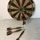 Old toy target round cardboard and feather darts 1960