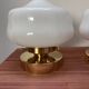 Pair of white opaline globe wall lights