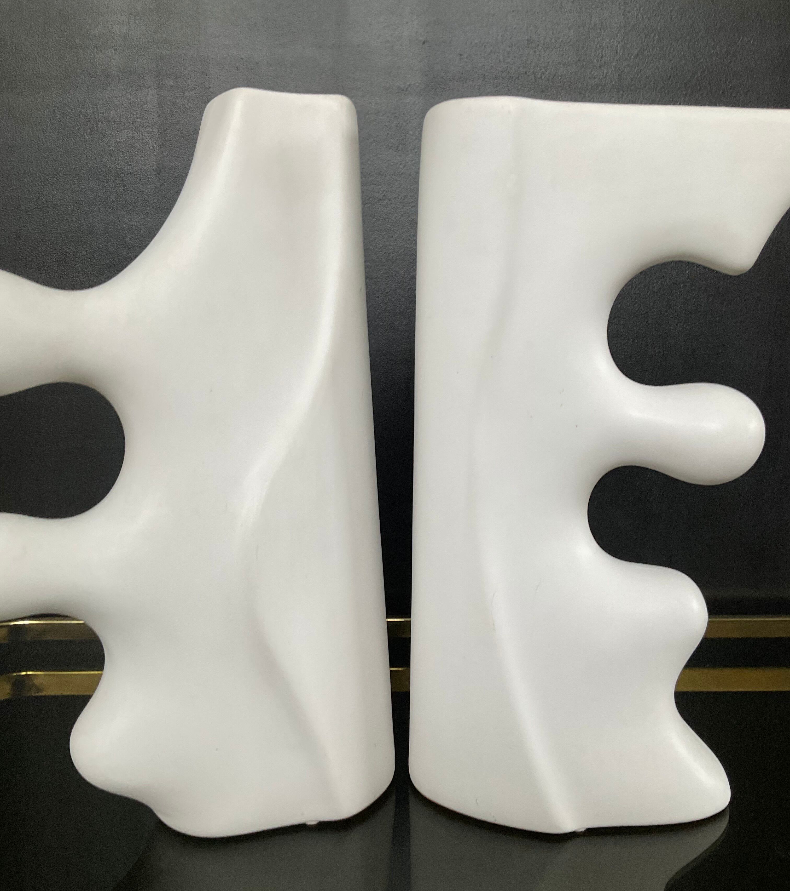 A pair of large designer ceramic vases.