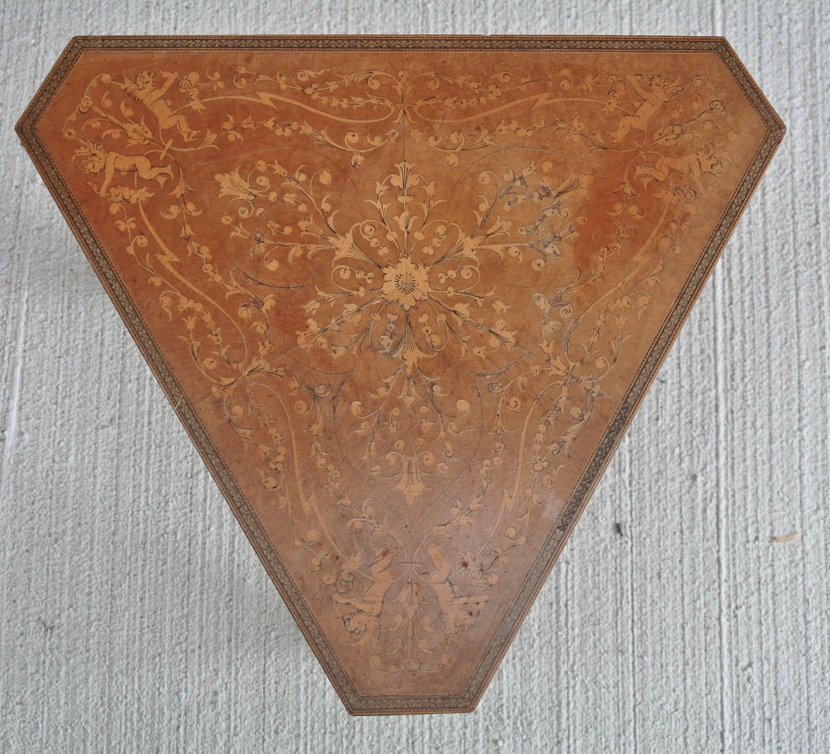Musical coffee table of triangular shape, fruit wood, tray and feet with marquetry décor