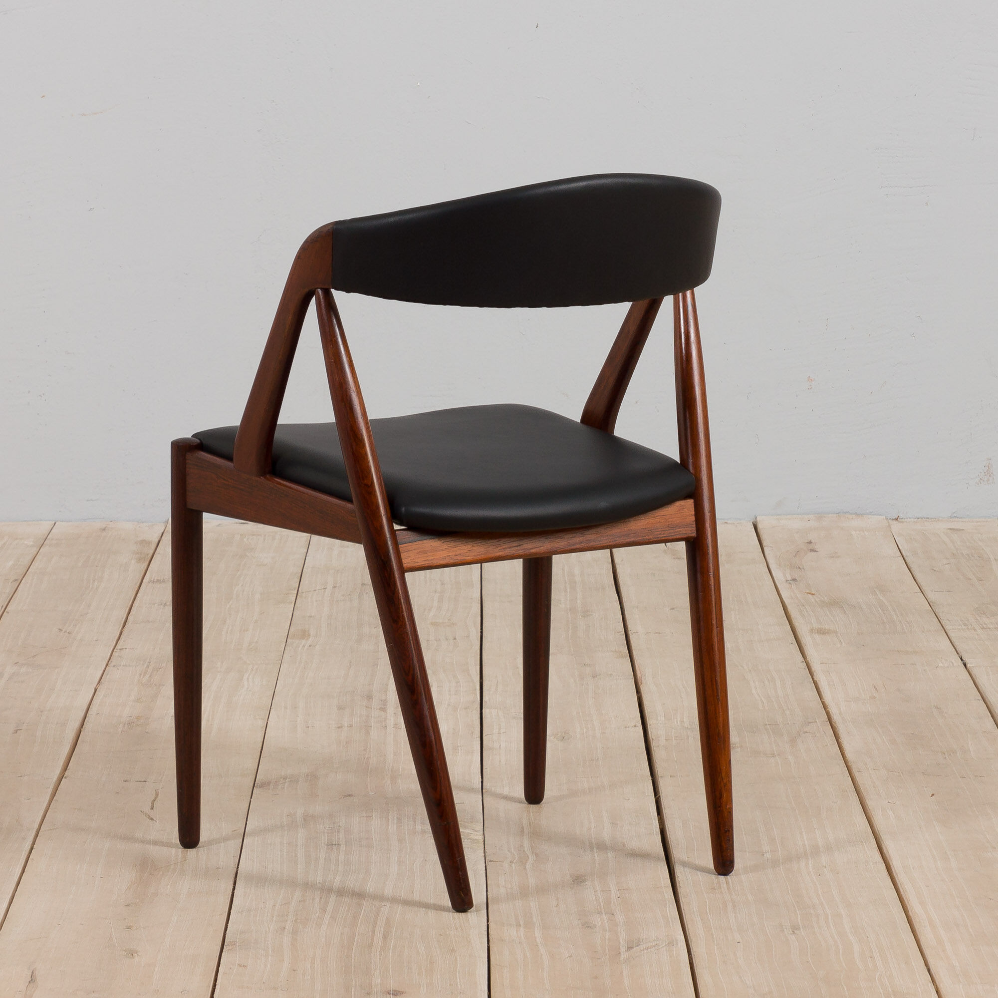 Kai Kristiansen rosewood desk chair 31 in reupholstered in soft black leather, Denmark, 60s