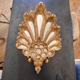Palm-shaped faceted mirror