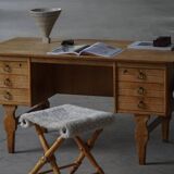 Pair of Danish mid-century folding stools with sheepskin upholstery, 1960.