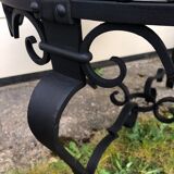 Low marble and black metal table