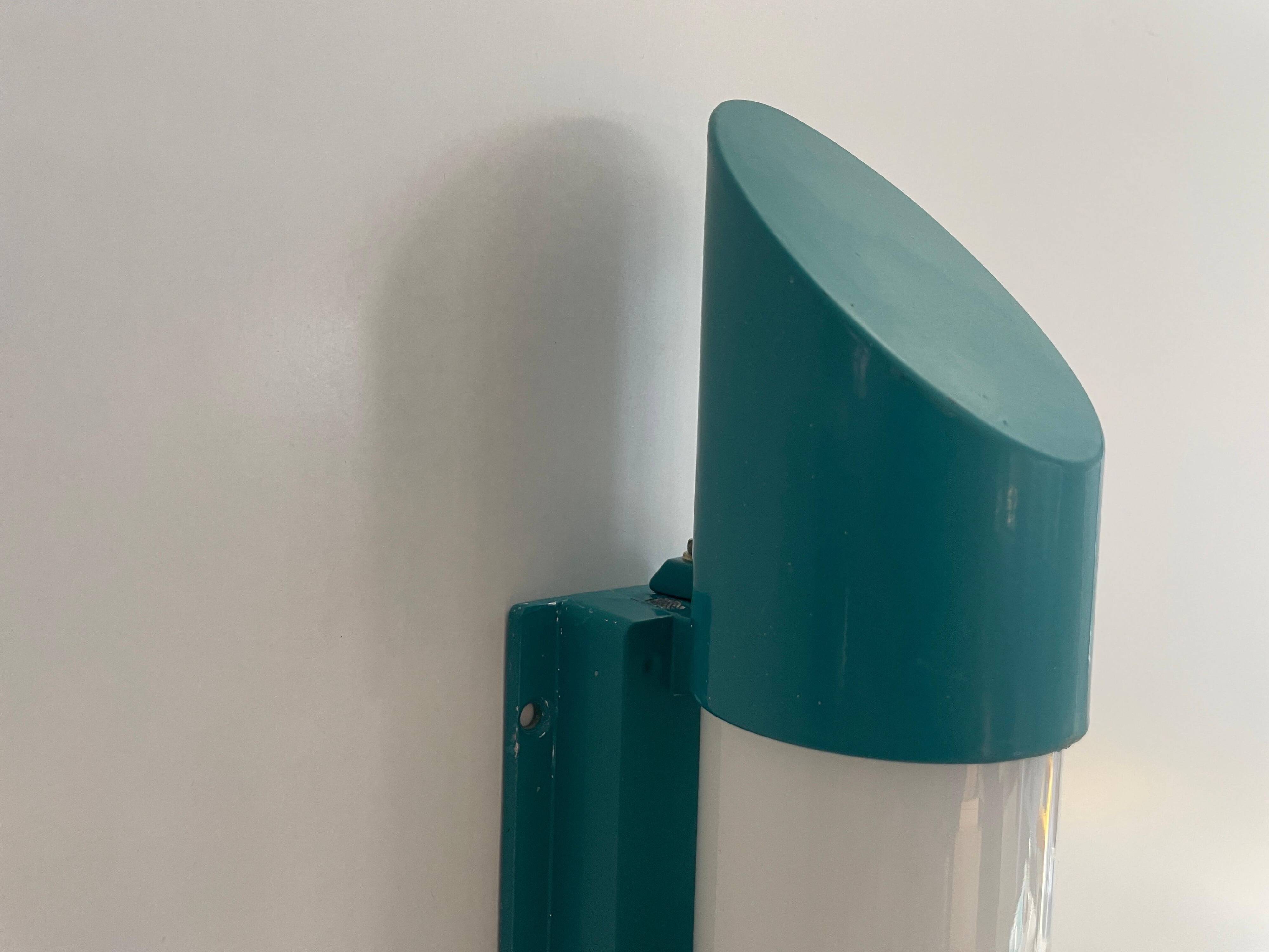 Simple cylindrical wall light in opal glass and turquoise metal, 1970s, Germany