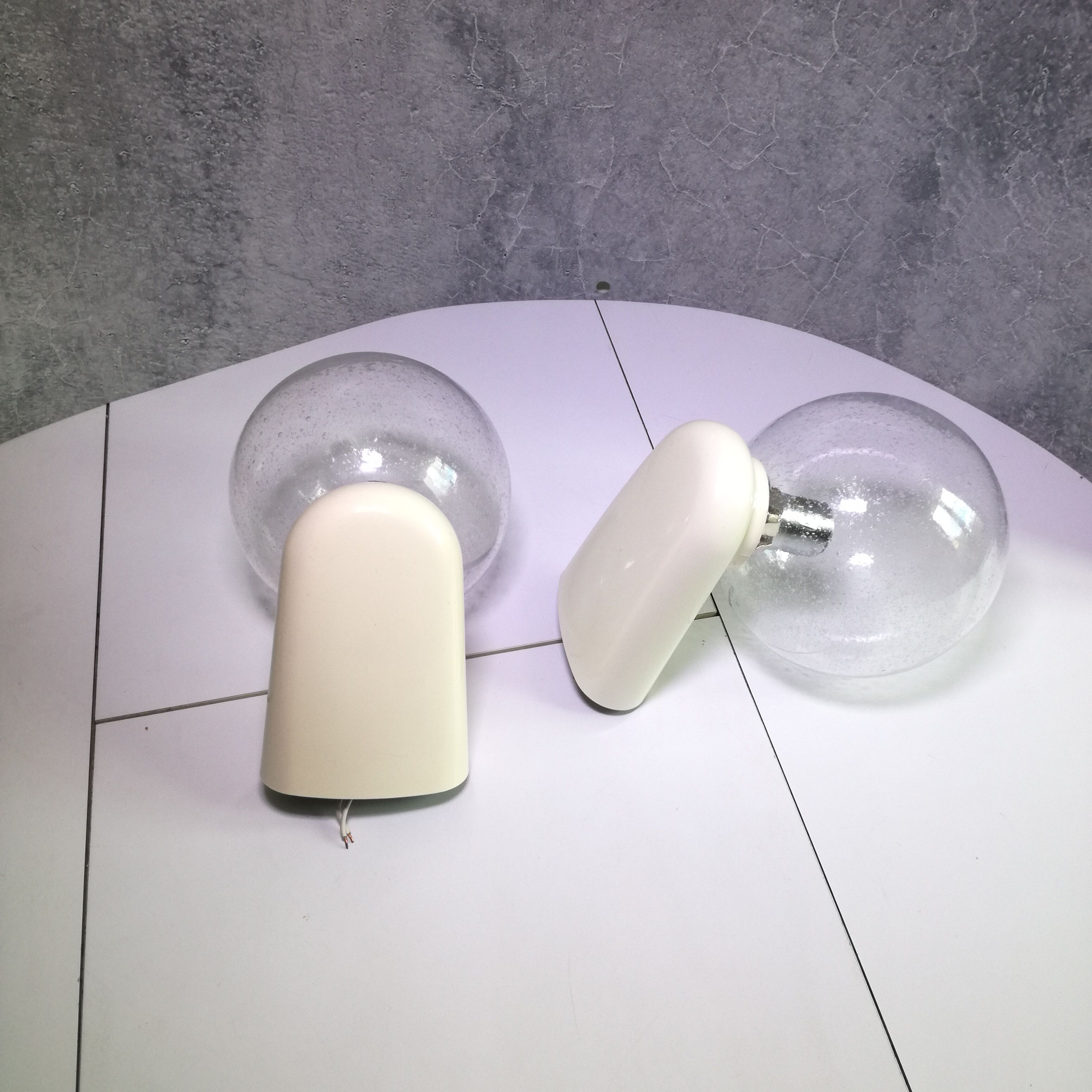 Pair of bubbled glass and plastic wall lamps by Dietsche, Germany