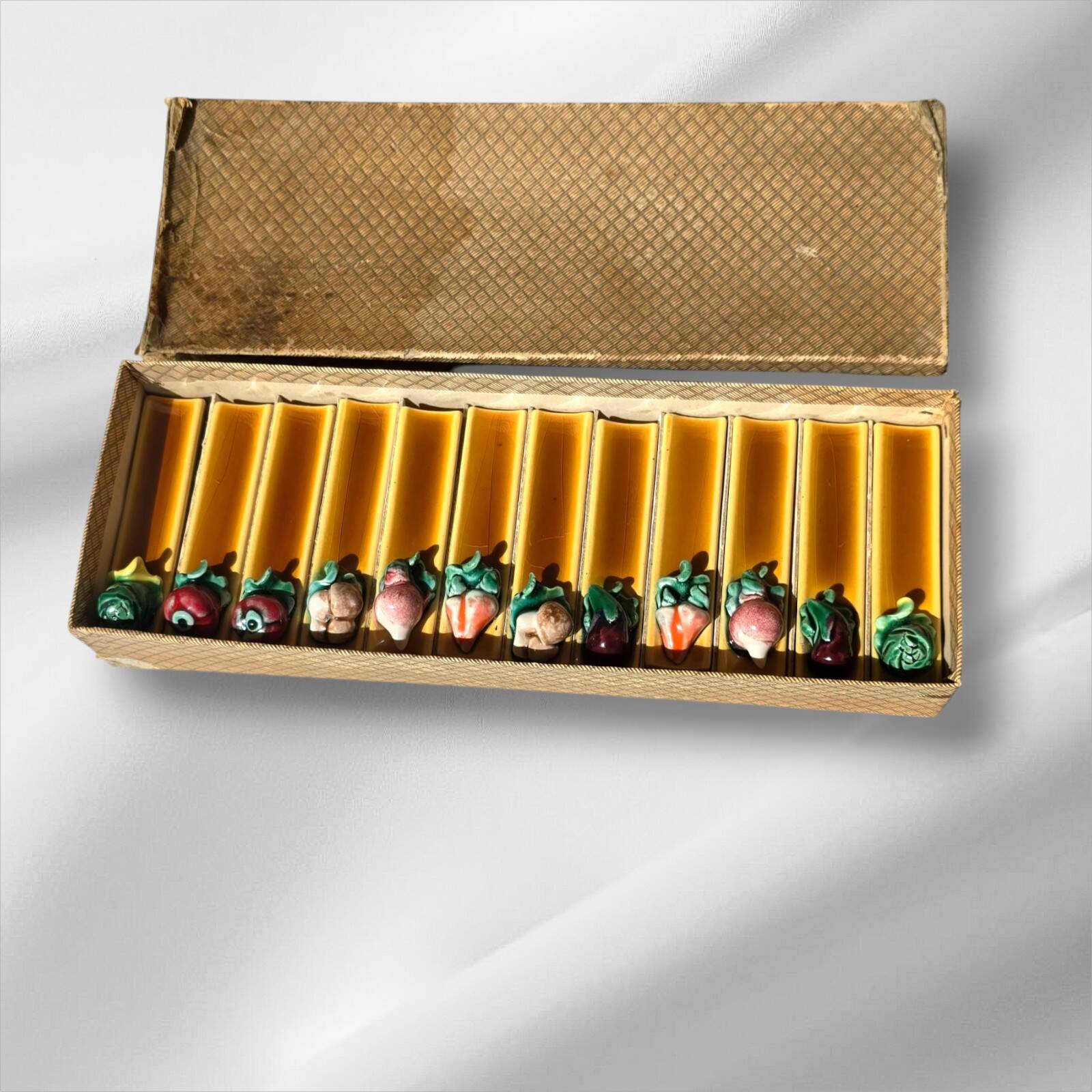 Set of twelve Vallauris majolica vegetable knife holders, 1950
