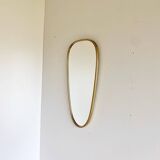 Vintage brass mirror in rear-view mirror shape