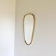 Vintage brass mirror in rear-view mirror shape