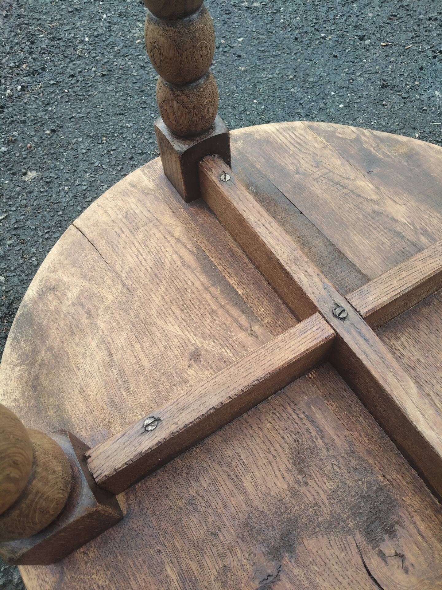 Oak gueridon in the style of Charles Dudouyt, 1940-50.