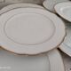 Lot de 12 assiettes plates en porcelaine suisse blanche double liseré doré "VSK USC Viribus Unitis"