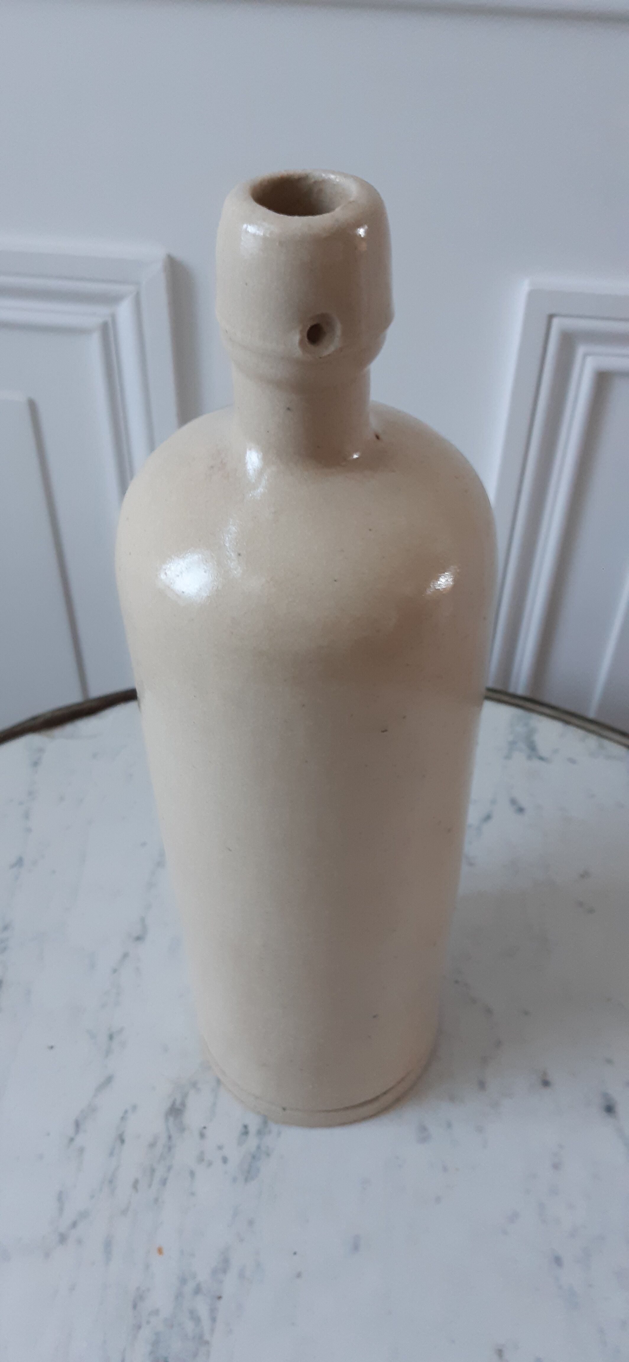 Bottle in ancient artisanal sandstone