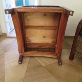 2 colonial-style armchairs in woven rattan and exotic wood
