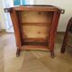 2 colonial-style armchairs in woven rattan and exotic wood