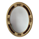 Antique medallion mirror with a gilded and relief-carved frame.