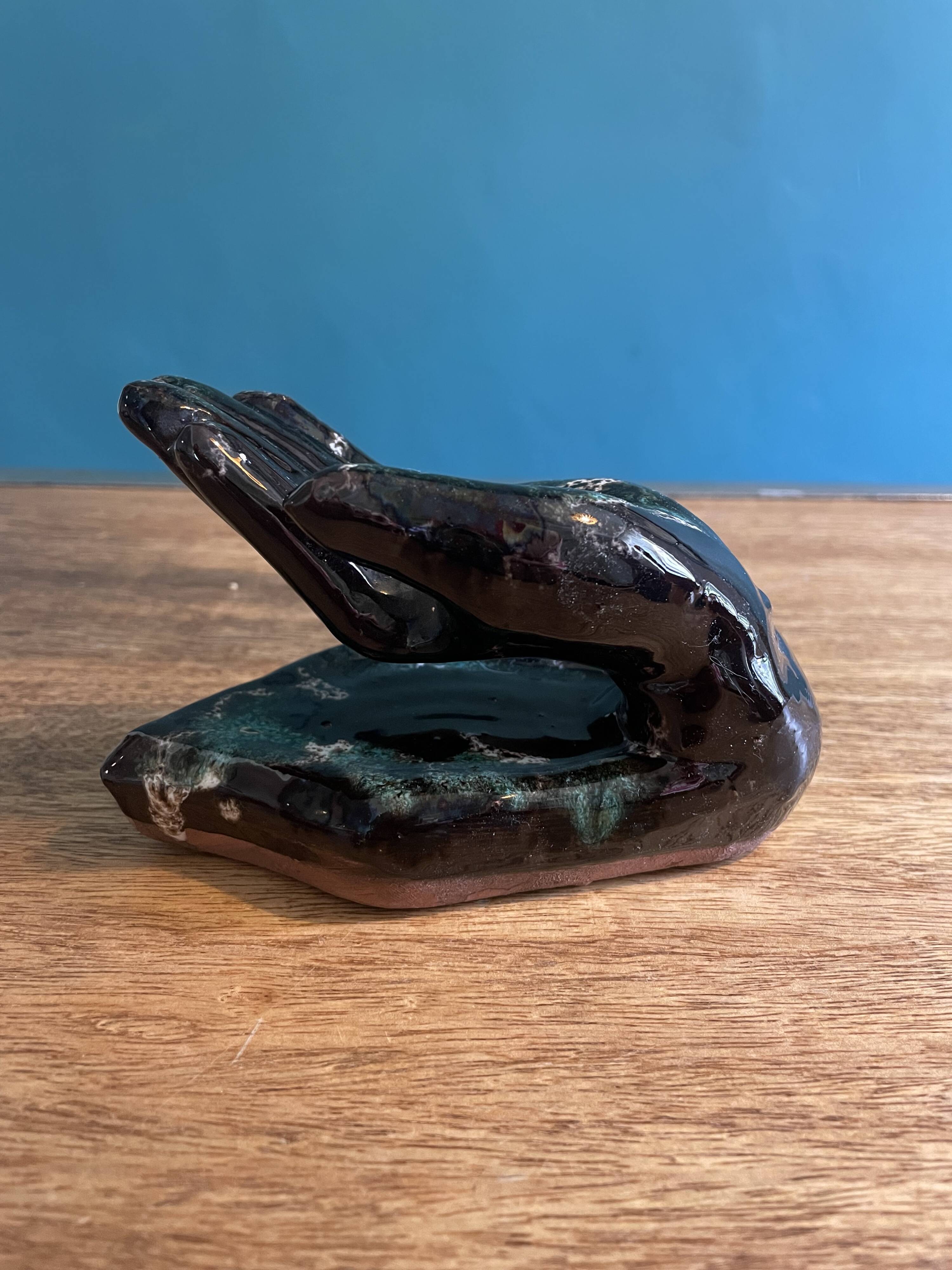 Hand-shaped coat hook