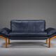 Danish teak and navy blue leather 2-seater sofa from Komfort, 1970s