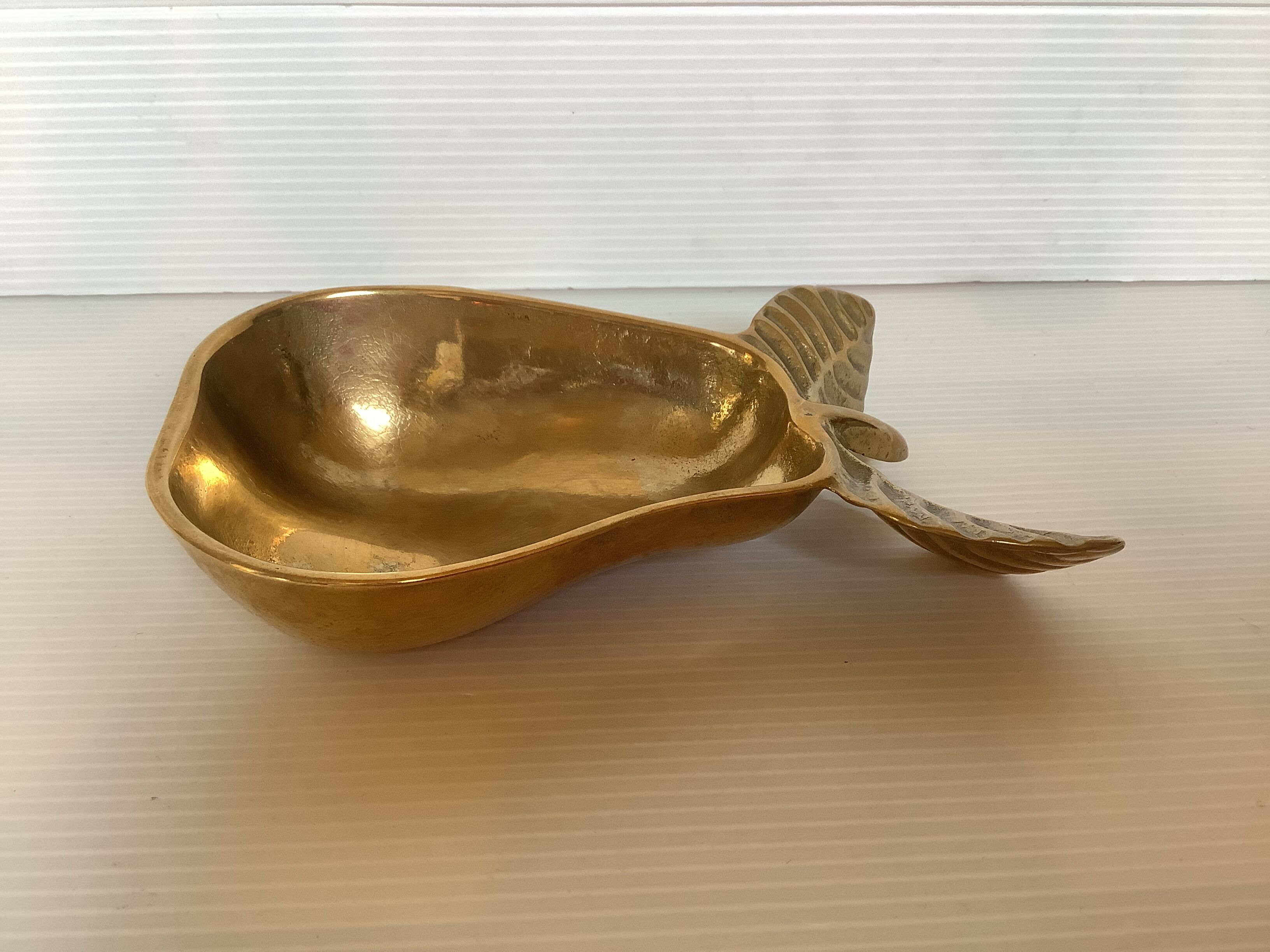 Empty pocket pear fruit brass