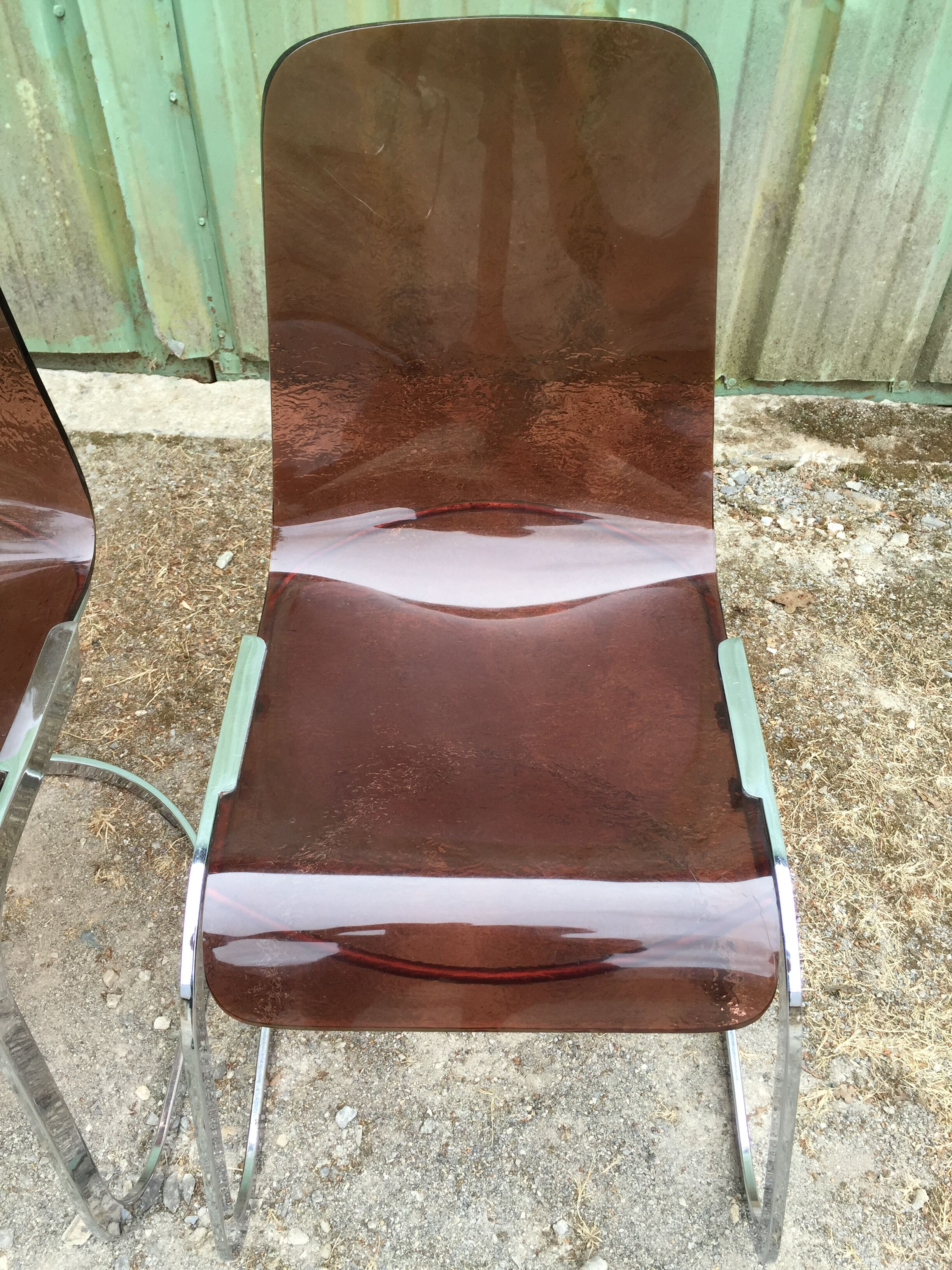 Chairs in plexiglas with chrome metal base