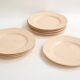 Set of 9 pink plates by Boch la Louvière