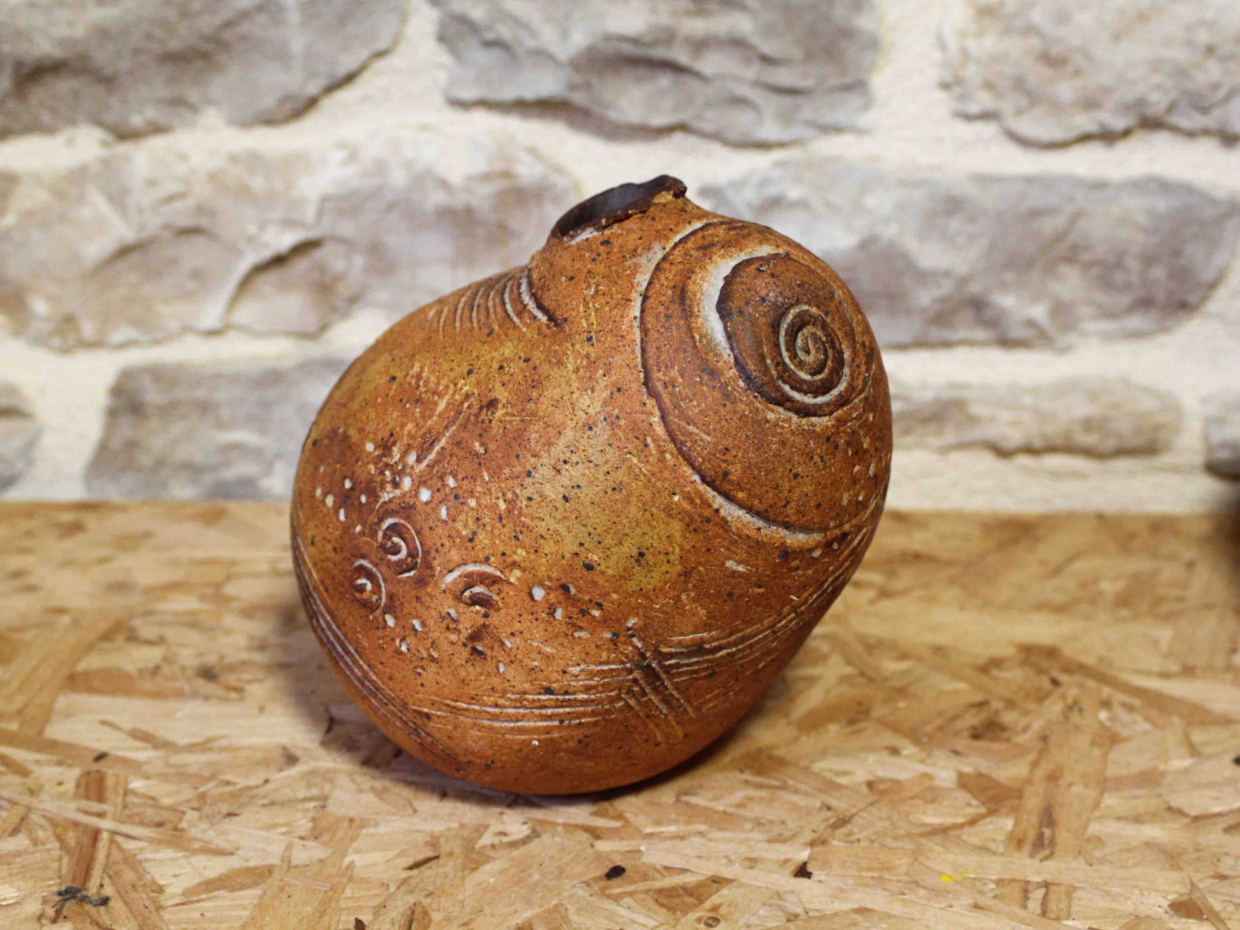 Stoneware vase with incised decoration