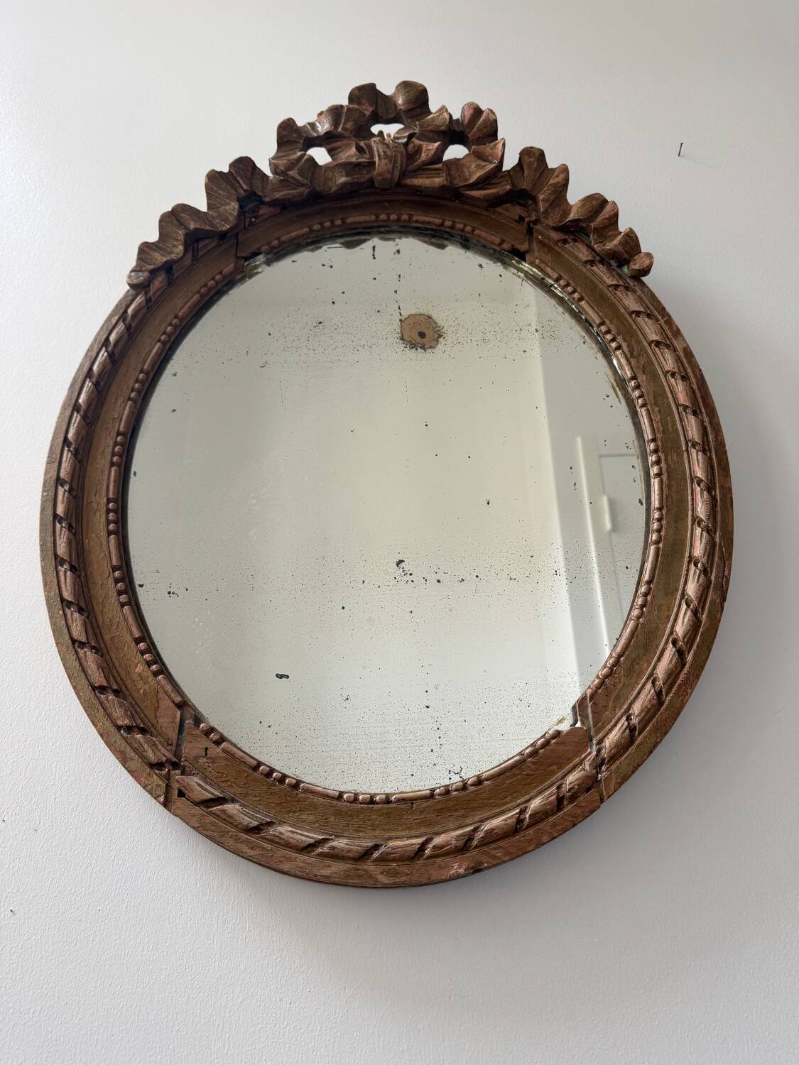 Antique Louis XVI oval knot mirror
