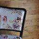 Art Deco chair in wood and white velvet, floral backrest from the 1930s.