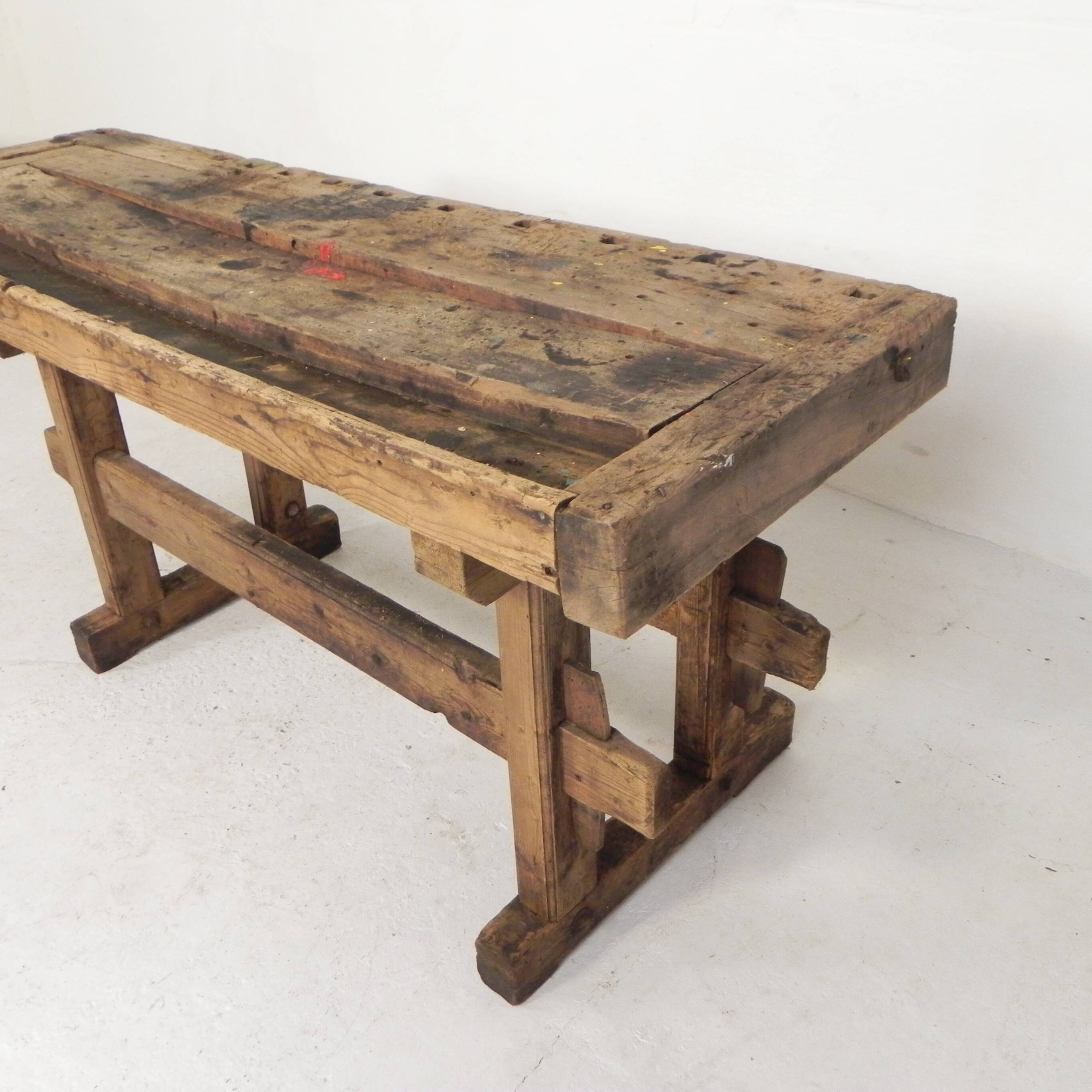 Wooden industrial workbench with vice, 194 cm long, 1930s.