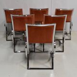 Suite de 6 chaises en métal chromé et feutrine brique 1970