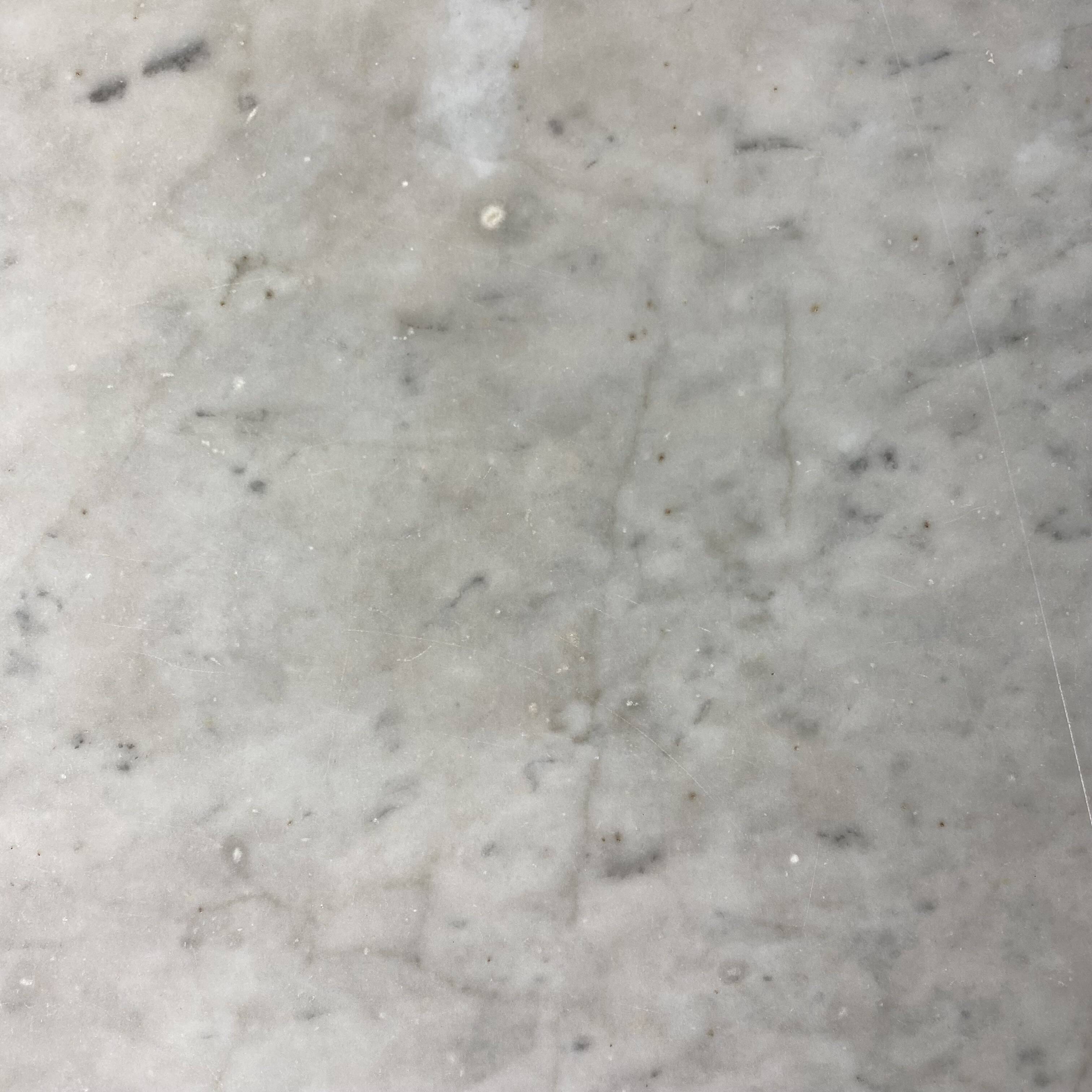 Set of two bistro tables in marble and wrought iron
