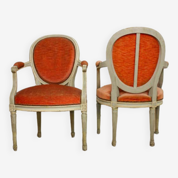 Paire de fauteuils médaillons de style Louis XVI en velours orange- vers 1950