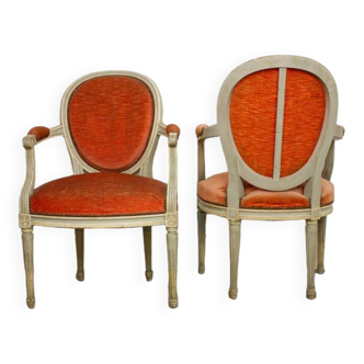 Paire de fauteuils médaillons de style Louis XVI en velours orange- vers 1950