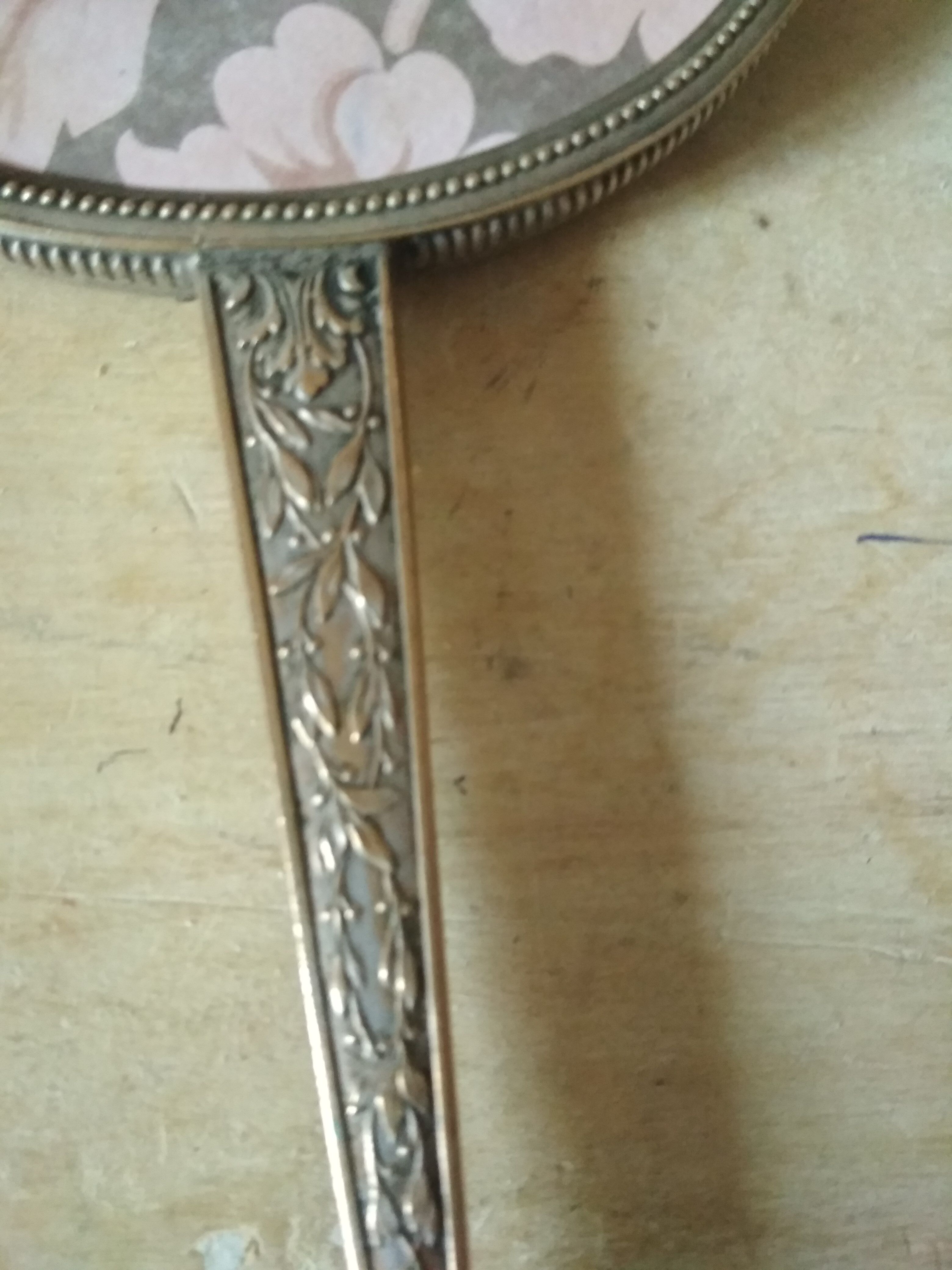 Old hand mirror beveled glass