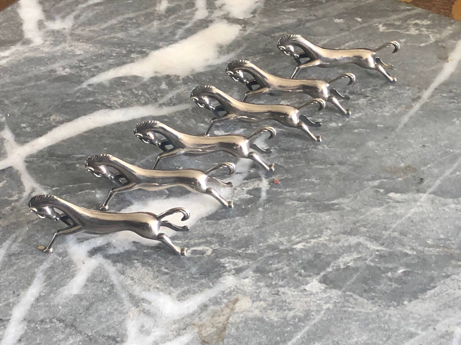 6 knife holders, horse.