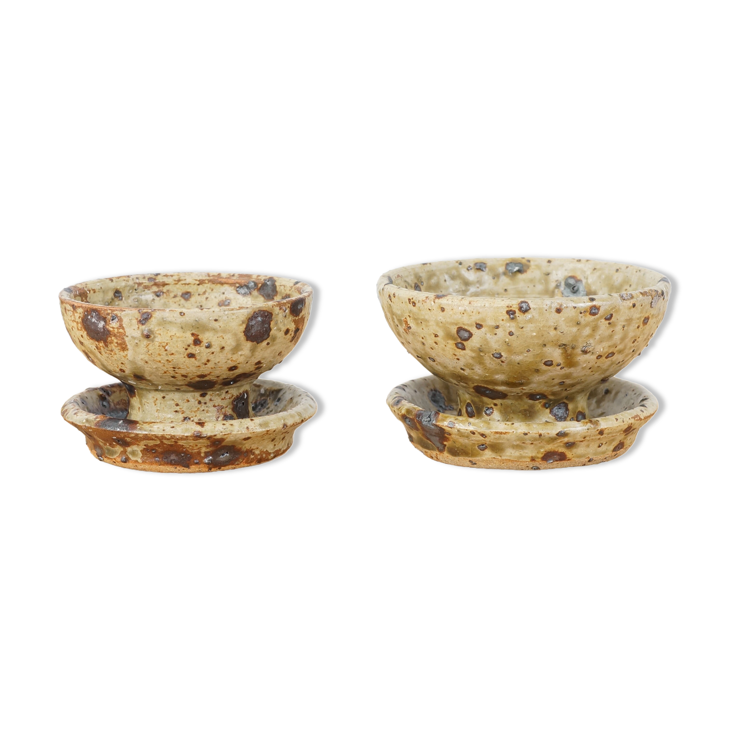 Pair of vergy speckled sandstone candle holders, vintage