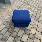Mid-century blue fabric ottoman stool, 1950s compact modernist design.