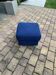 Mid-century blue fabric ottoman stool, 1950s compact modernist design.