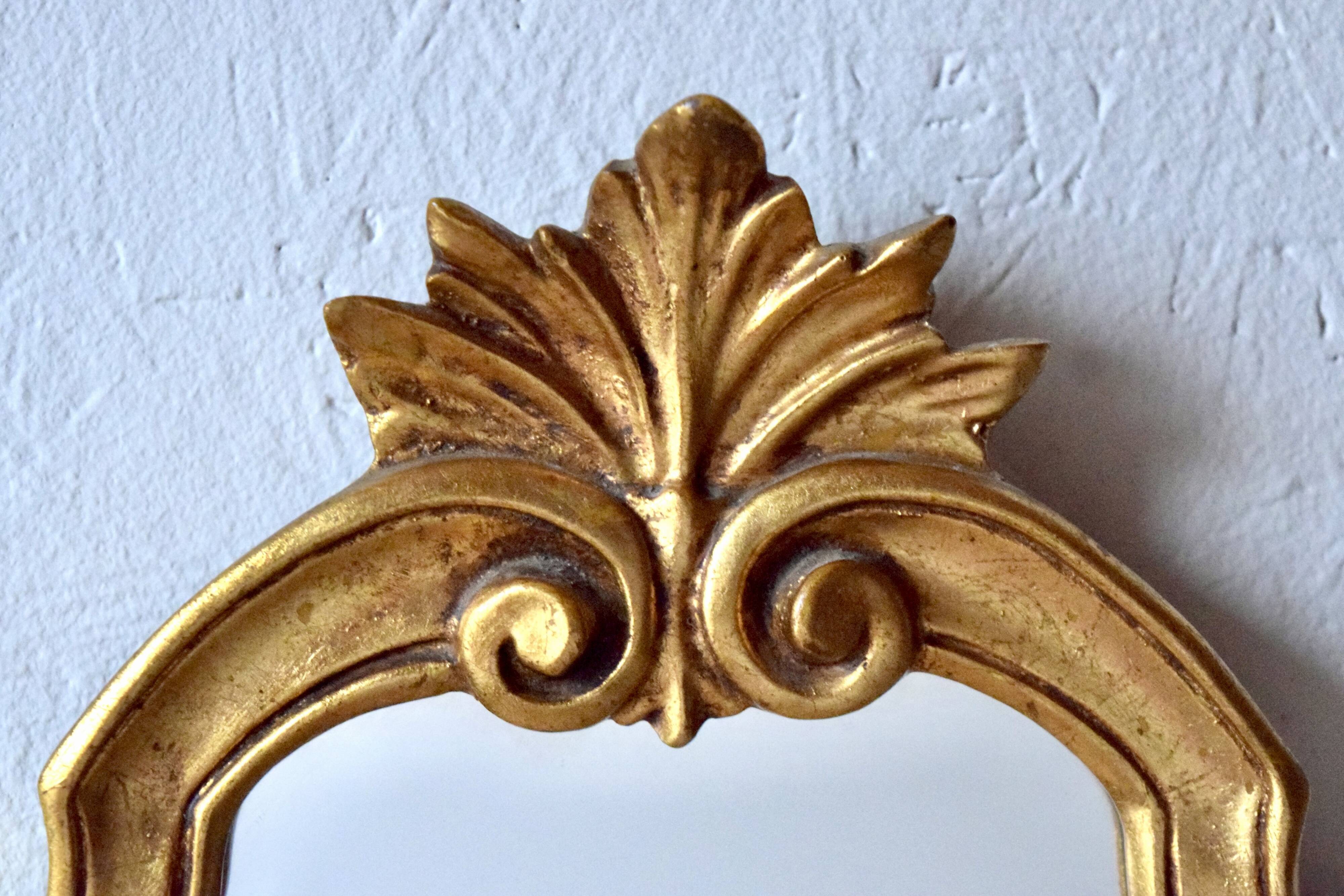 Old wall mirror in golden resin - rococo style