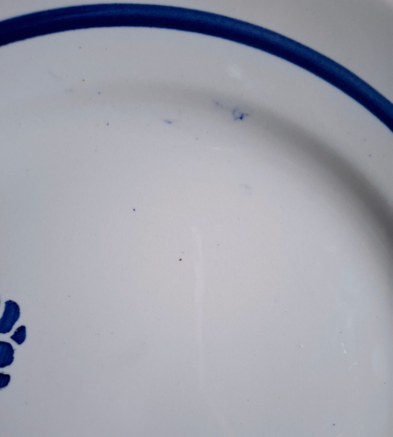 Mismatched antique flat plates in earthenware