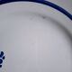 Mismatched antique flat plates in earthenware
