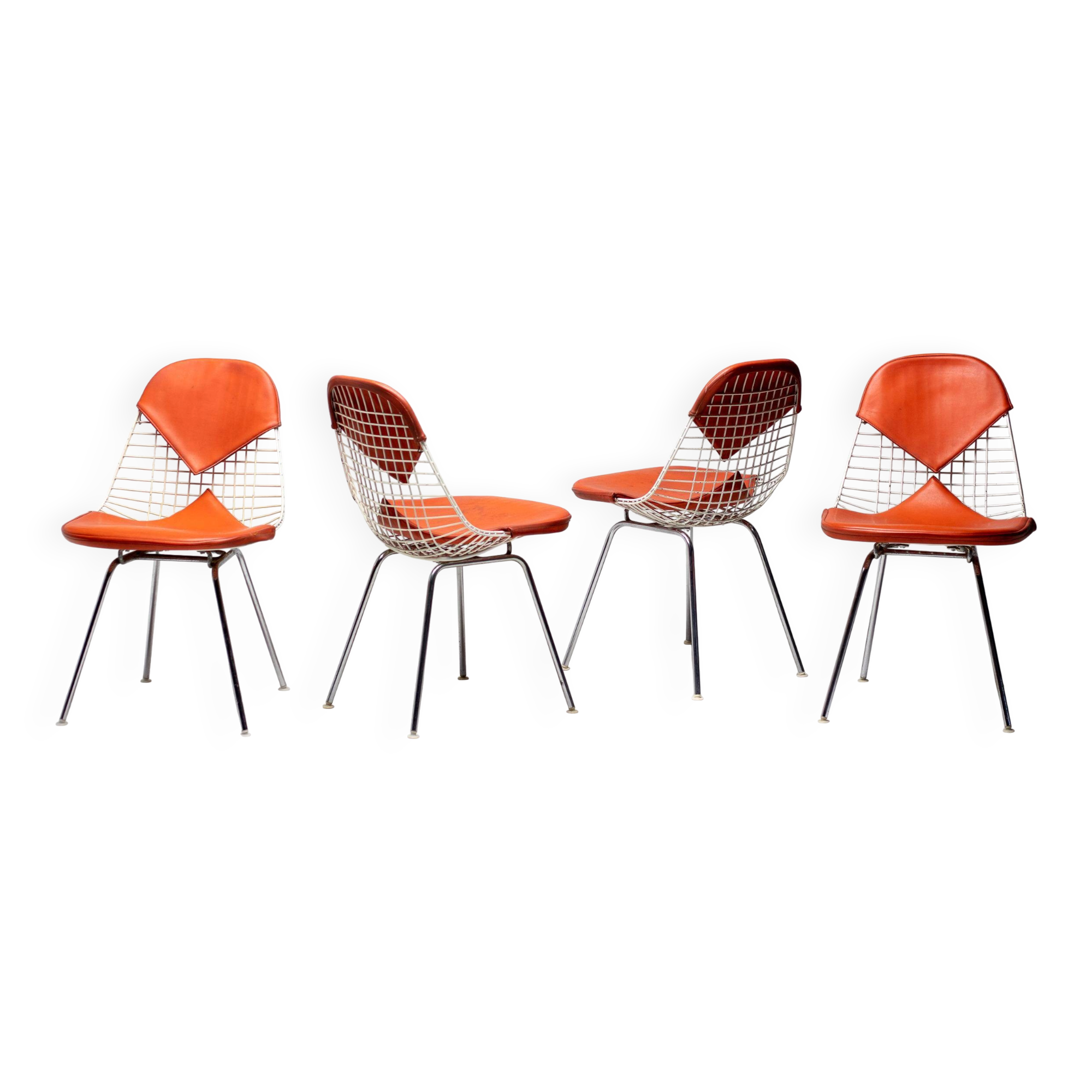 Set of 4 Eames wire chairs for Herman Miller with original Bikini seats by Girard.