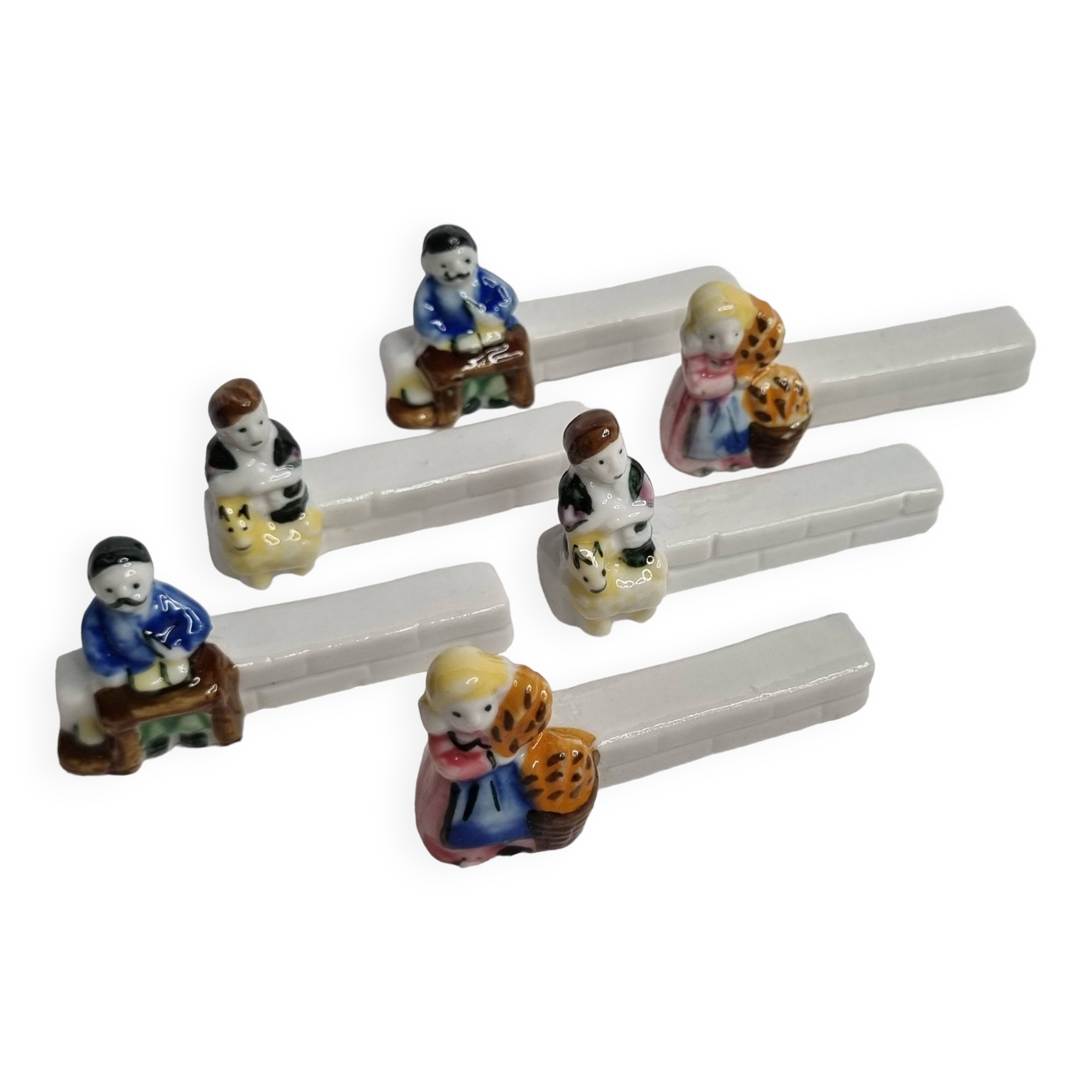 Six Le Merzer porcelain knife holders, 6 cm